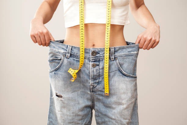 Person showing weight loss after going to a weight loss clinic in Amarillo
